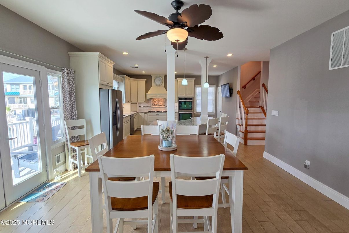 Dining room, Interior, Kitchen, Recessed Lighting, Stainless Steel Appliances, Wood Texture Flooring