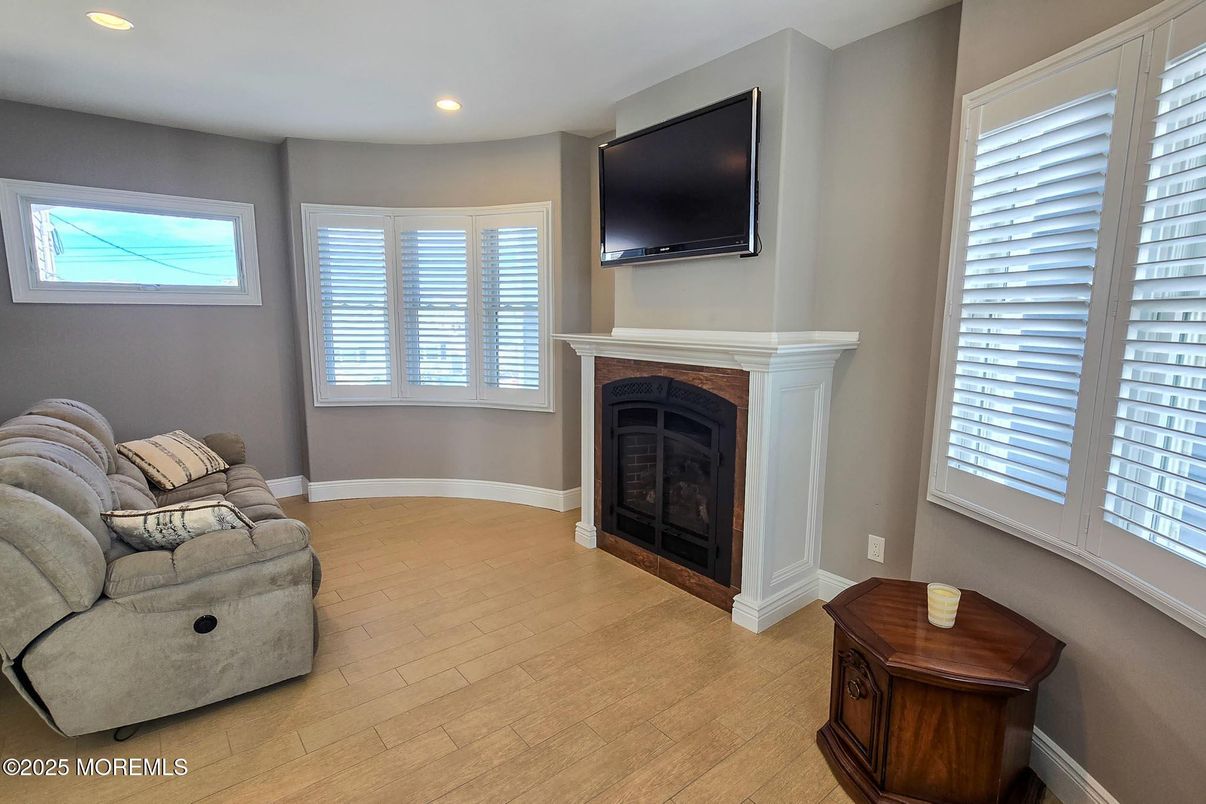 Fireplace, Interior, Recessed Lighting, Wood Texture Flooring