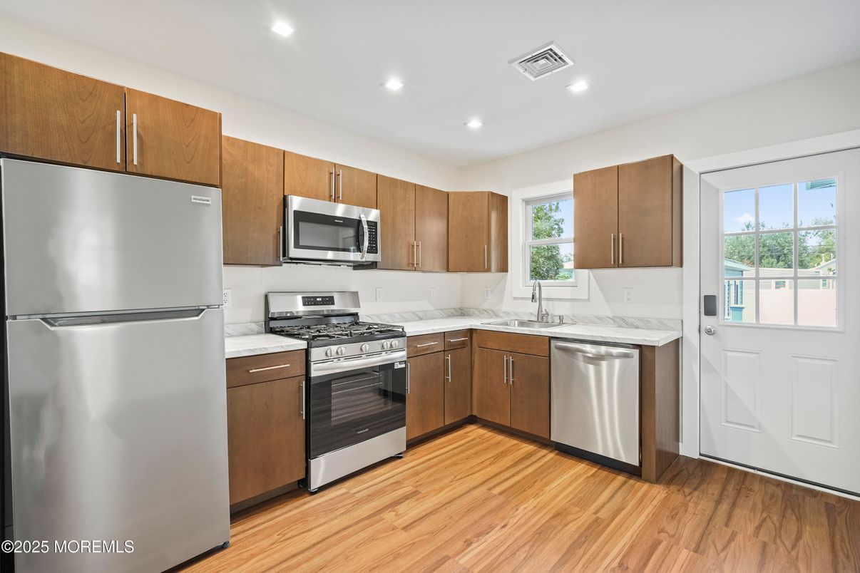 Interior, Kitchen, Recessed Lighting, Stainless Steel Appliances, Wood Texture Flooring