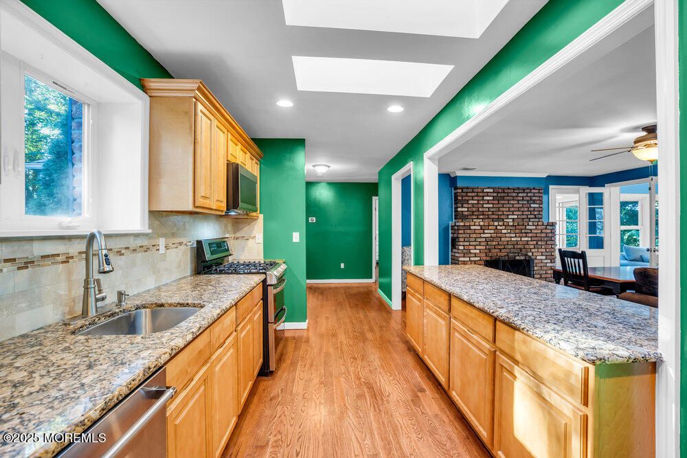 Fireplace, Interior, Kitchen, Recessed Lighting, Stone Walls, Wood Texture Flooring