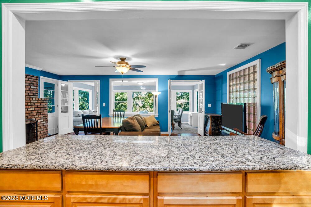 Dining room, Fireplace, Interior, Recessed Lighting, Stone Walls