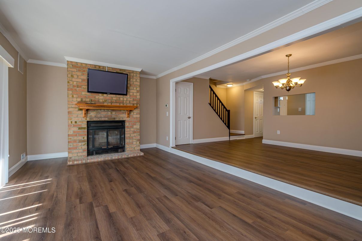 Chandelier, Empty room, Fireplace, Interior, Wood Texture Flooring