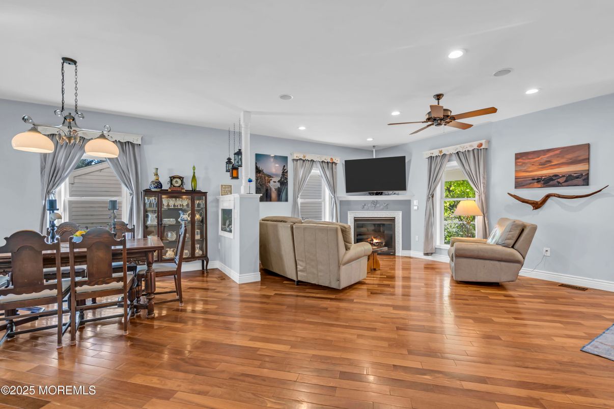 Dining room, Fireplace, Interior, Living room, Pendant Lights, Recessed Lighting, Wood Texture Flooring