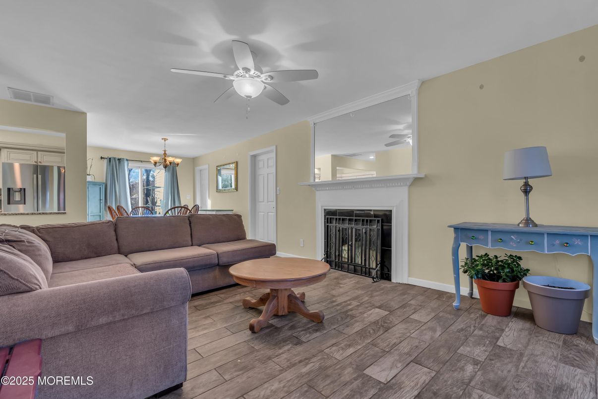 Chandelier, Dining room, Fireplace, Interior, Living room, Wood Texture Flooring