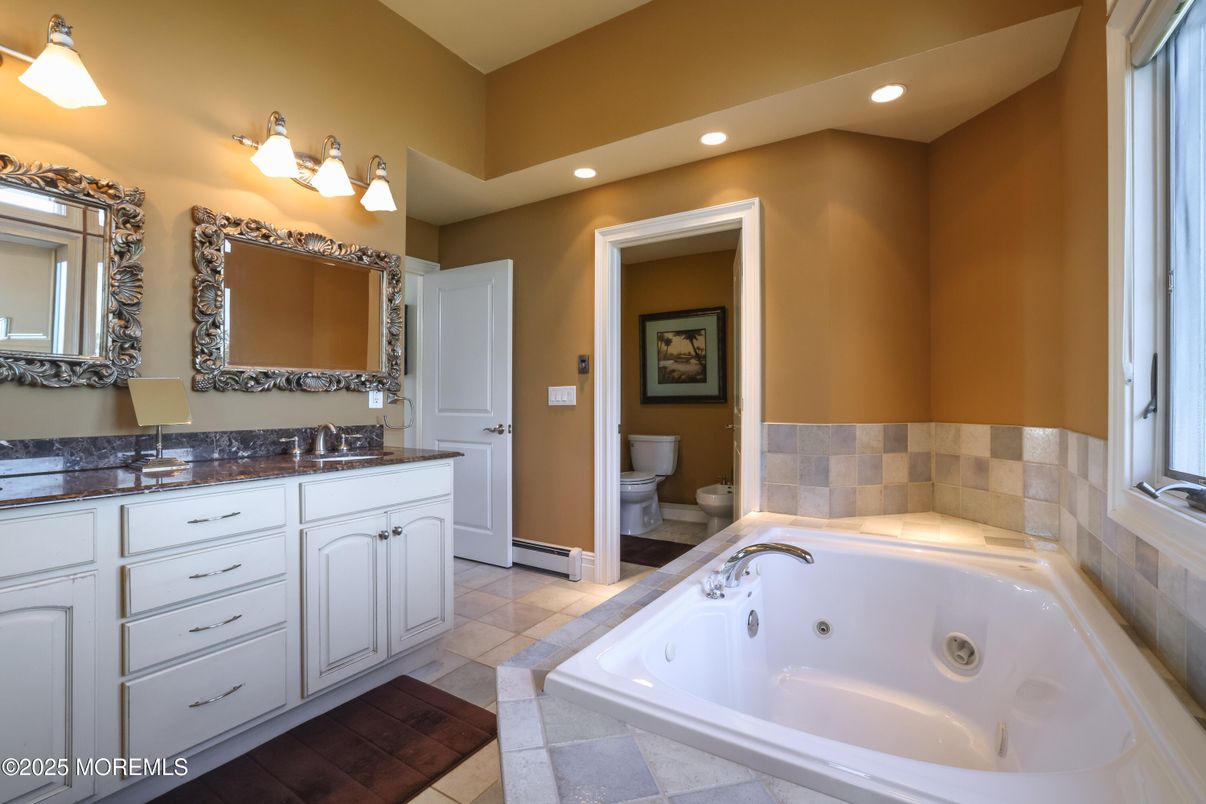 Bathroom, Dual Sink Vanities, Interior, Recessed Lighting, Wood Texture Flooring
