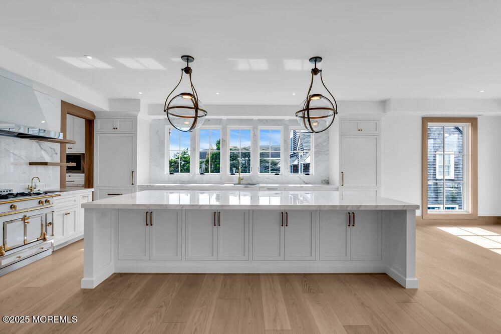 Interior, Kitchen, Marble Walls, Pendant Lights, Recessed Lighting, Wood Texture Flooring