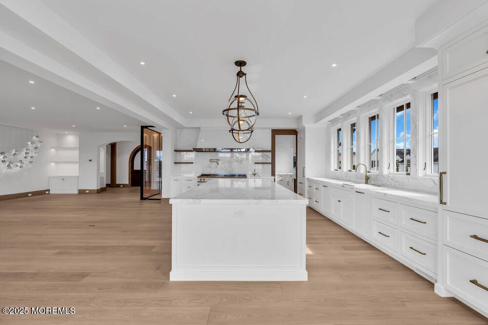 Chandelier, Interior, Kitchen, Marble Walls, Pendant Lights, Recessed Lighting, Wood Texture Flooring