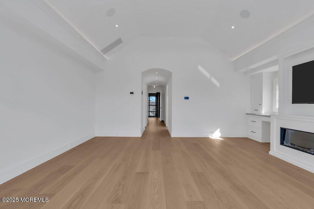 Empty room, Fireplace, Interior, Recessed Lighting, Wood Texture Flooring