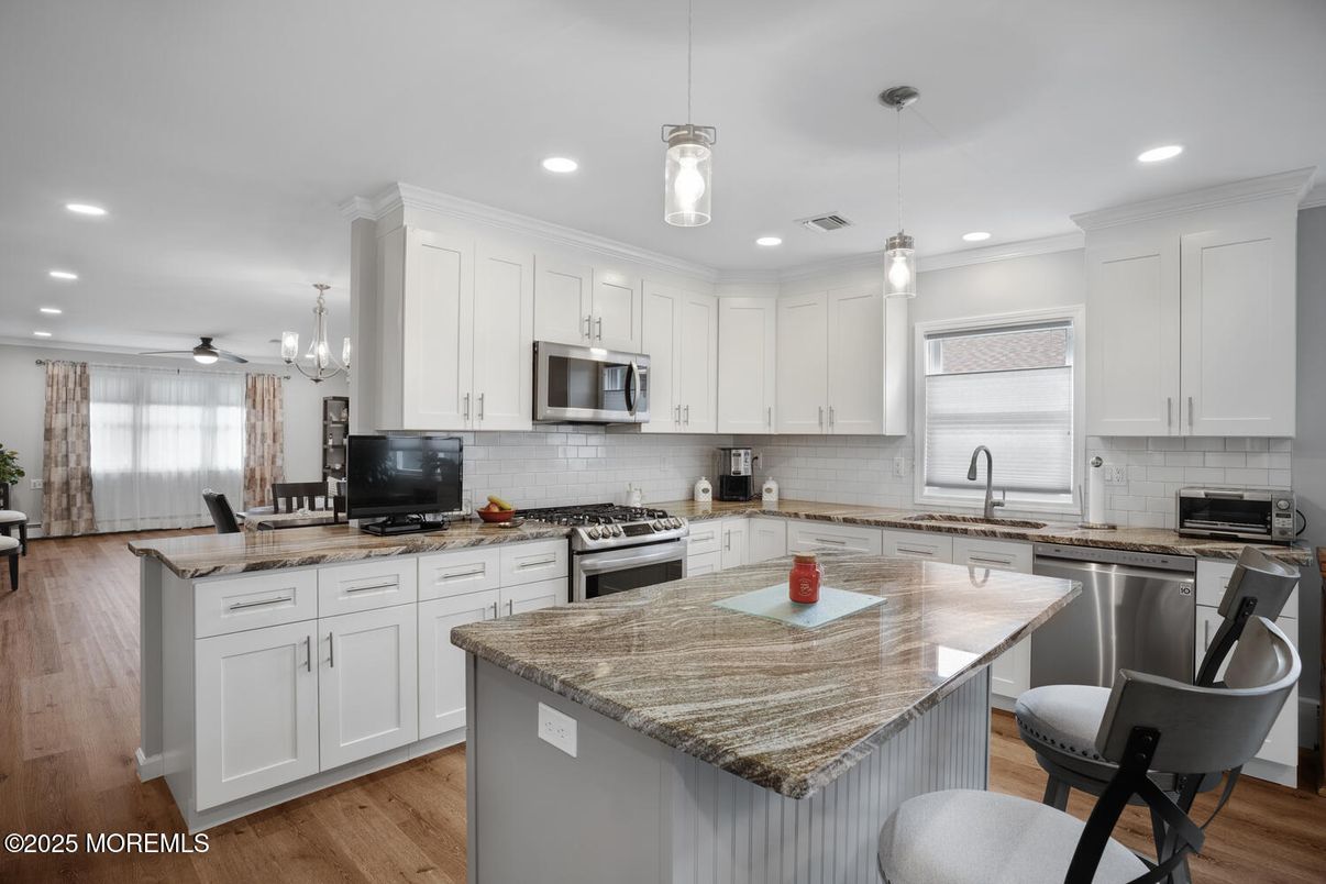 Interior, Kitchen, Pendant Lights, Recessed Lighting, Stainless Steel Appliances, Wood Texture Flooring