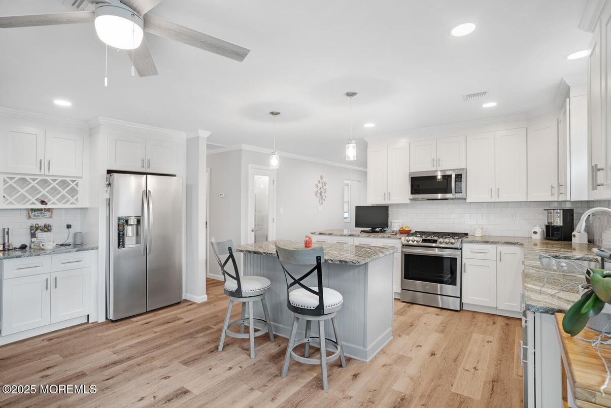 Interior, Kitchen, Pendant Lights, Recessed Lighting, Stainless Steel Appliances, Wood Texture Flooring
