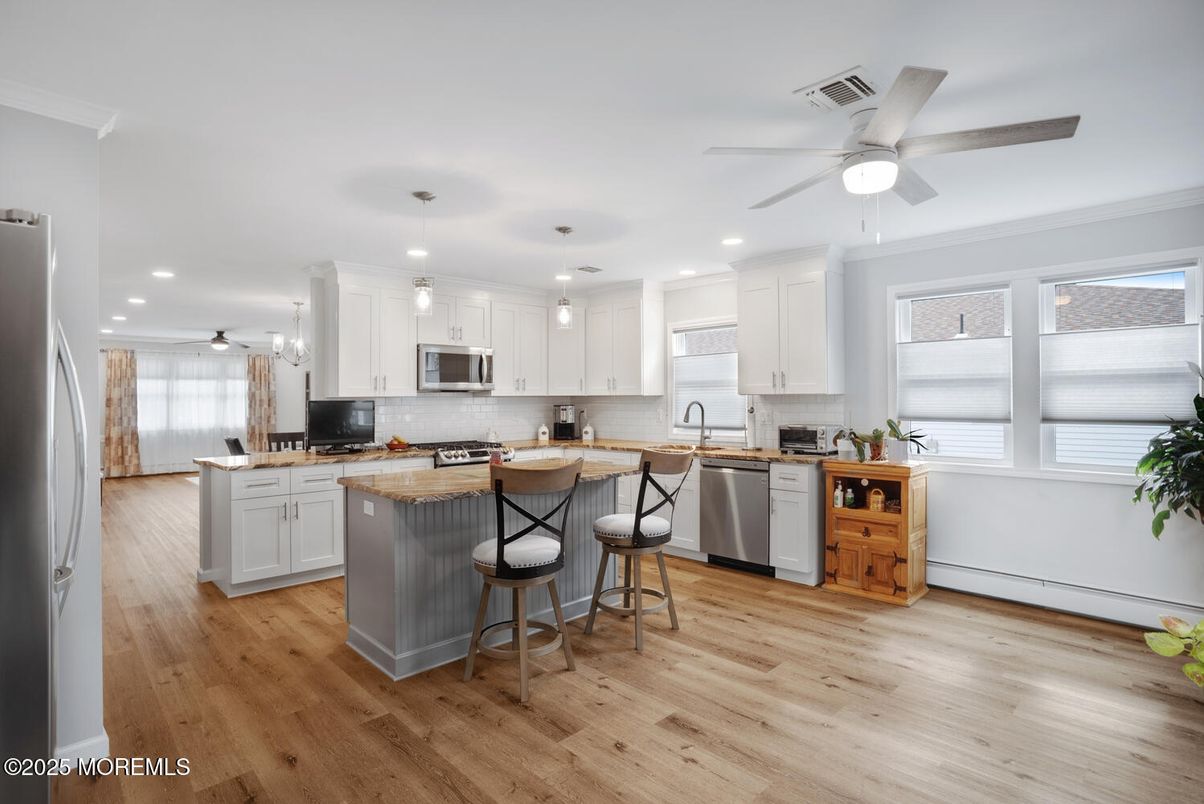 Interior, Kitchen, Pendant Lights, Recessed Lighting, Stainless Steel Appliances, Wood Texture Flooring
