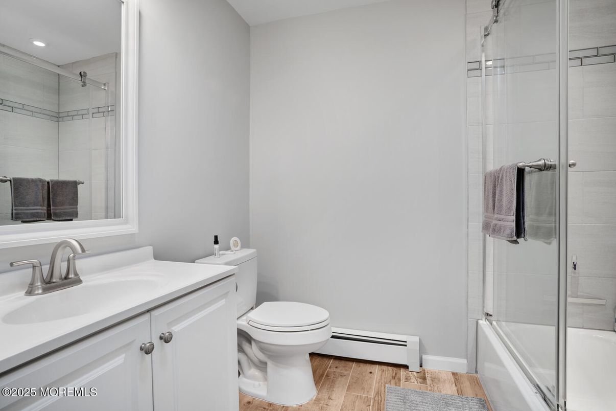 Bathroom, Glass Shower, Interior, Recessed Lighting, Wood Texture Flooring