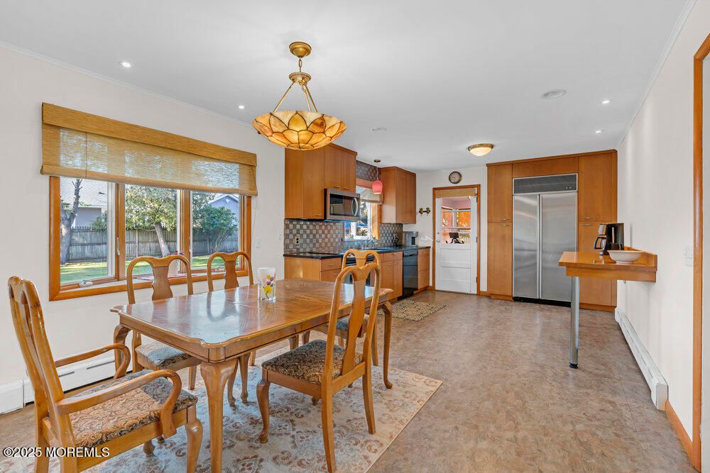 Chandelier, Dining room, Interior, Kitchen, Pendant Lights, Recessed Lighting, Stainless Steel Appliances