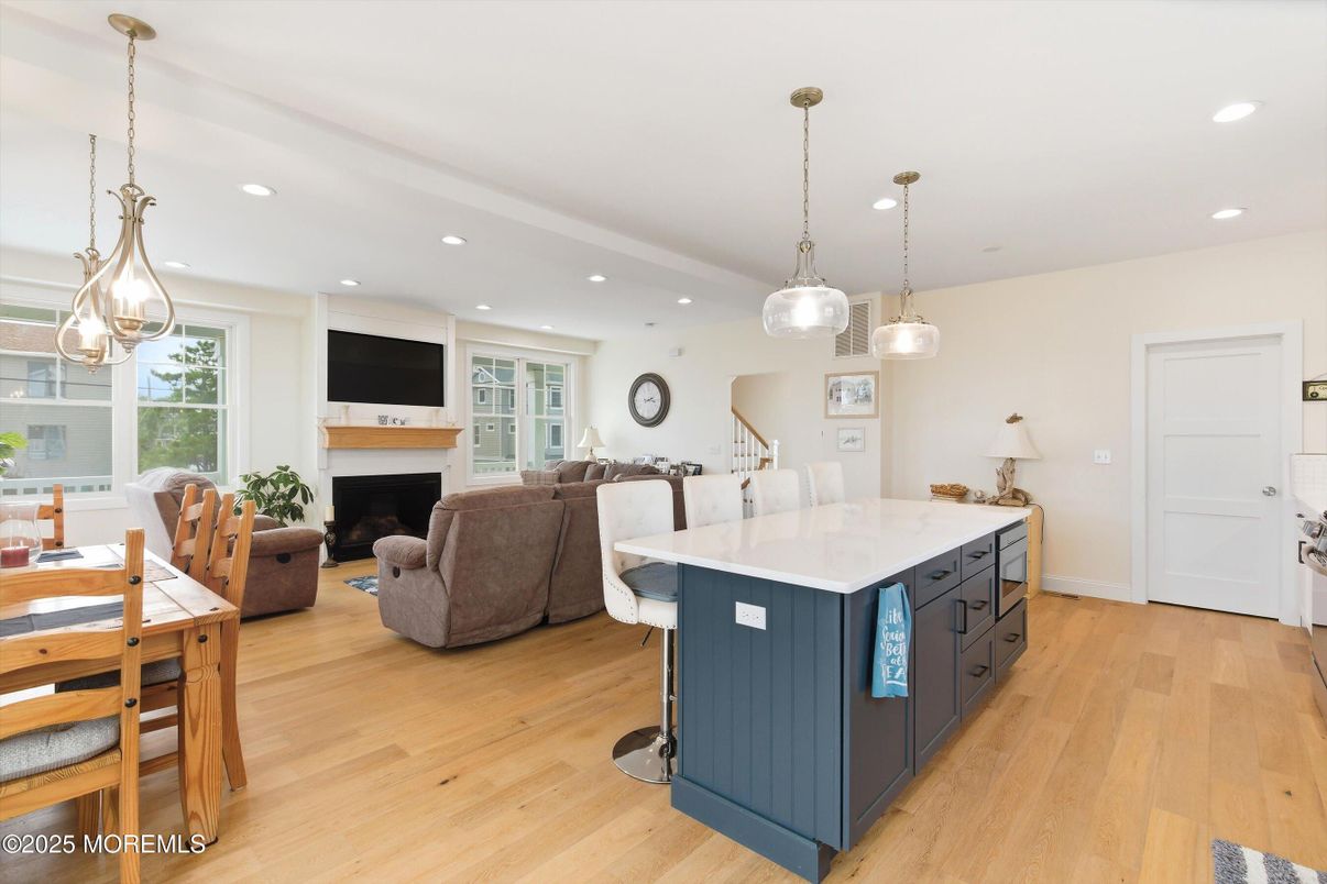 Fireplace, Interior, Kitchen, Living room, Pendant Lights, Recessed Lighting, Wood Texture Flooring