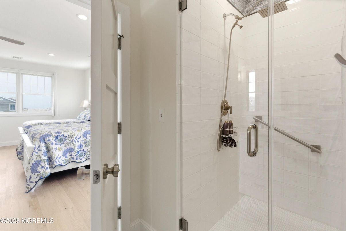 Bathroom, Bedroom, Glass Shower, Interior, Recessed Lighting, Wood Texture Flooring