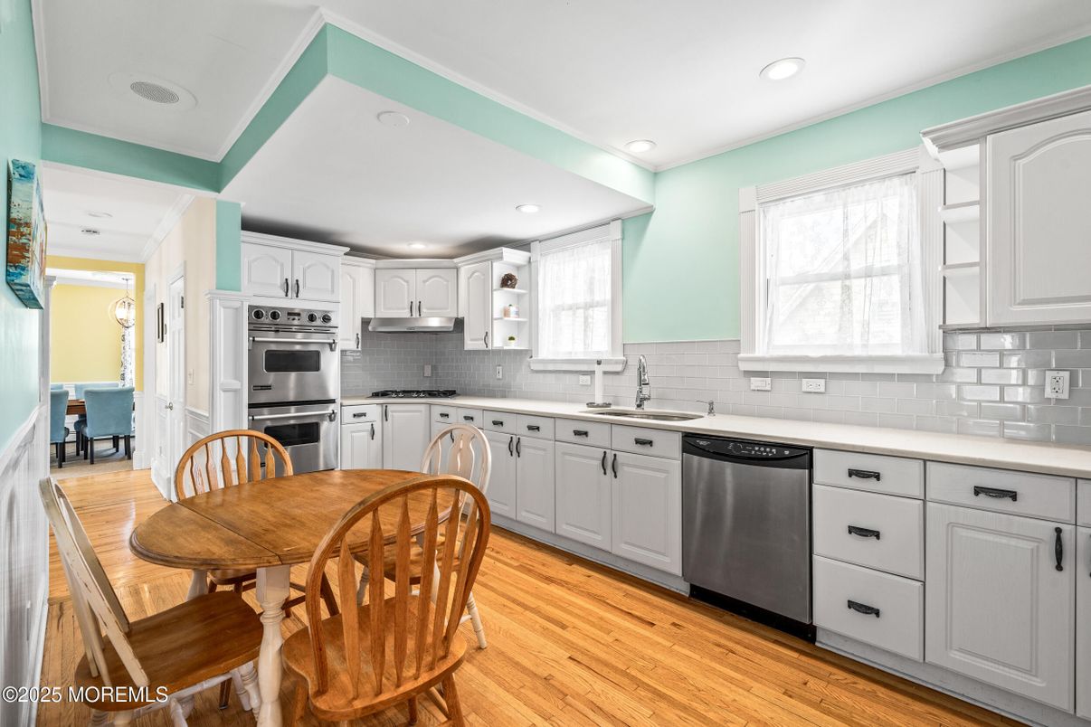 Dining room, Interior, Kitchen, Recessed Lighting, Stainless Steel Appliances, Wood Texture Flooring