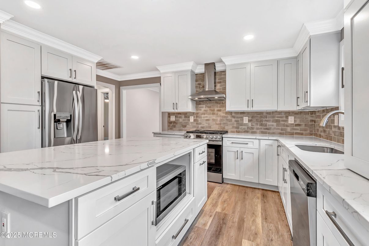Interior, Kitchen, Recessed Lighting, Stainless Steel Appliances, Wood Texture Flooring