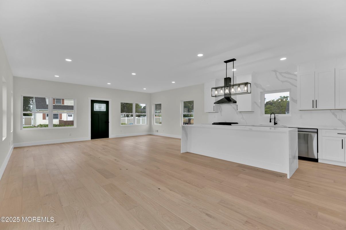 Interior, Kitchen, Marble Walls, Pendant Lights, Recessed Lighting, Wood Texture Flooring