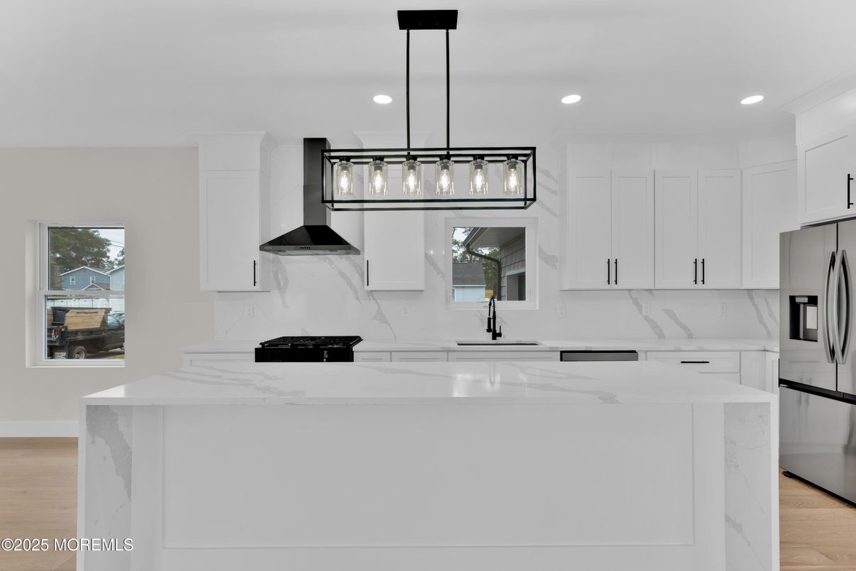 Interior, Kitchen, Marble Walls, Pendant Lights, Recessed Lighting, Wood Texture Flooring