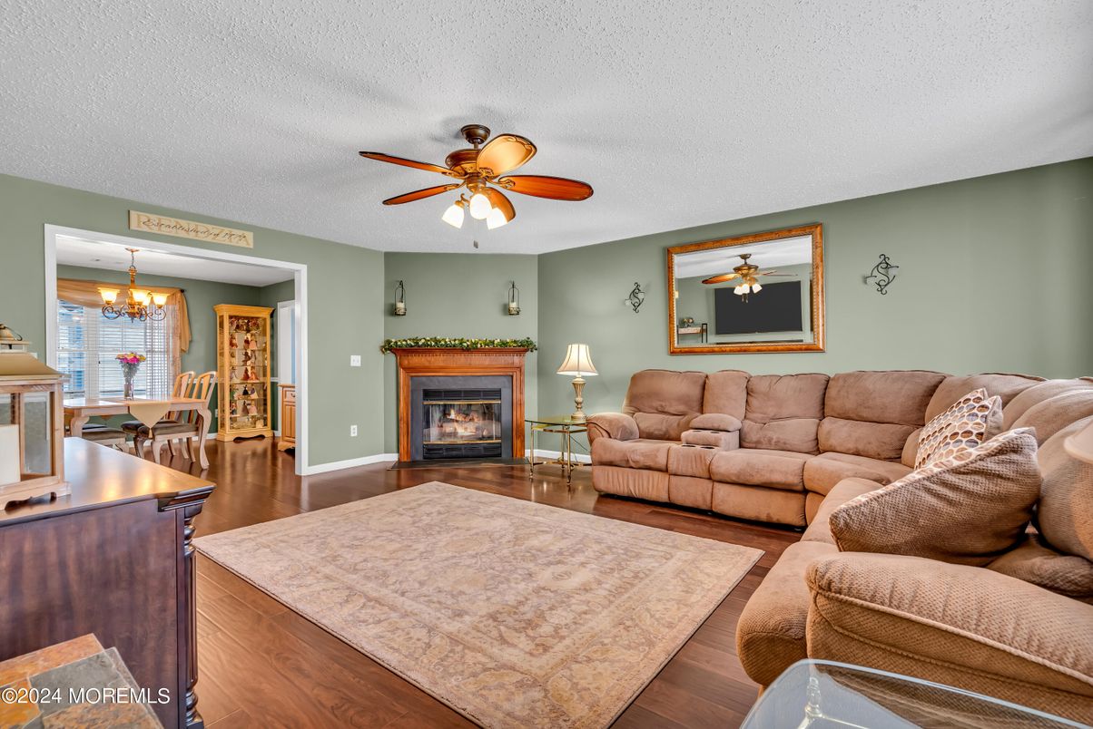 Chandelier, Dining room, Fireplace, Interior, Living room, Wood Texture Flooring
