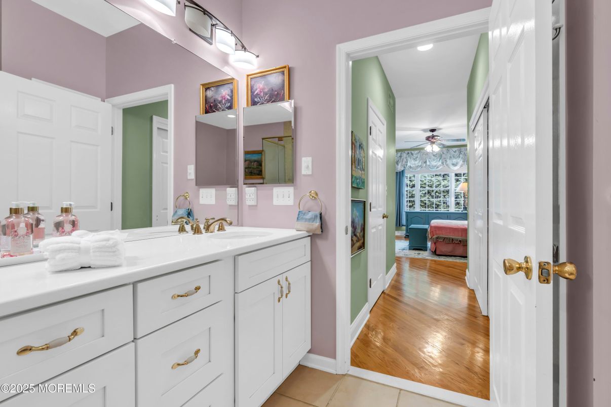 Bathroom, Dual Sink Vanities, Interior, Recessed Lighting, Wood Texture Flooring
