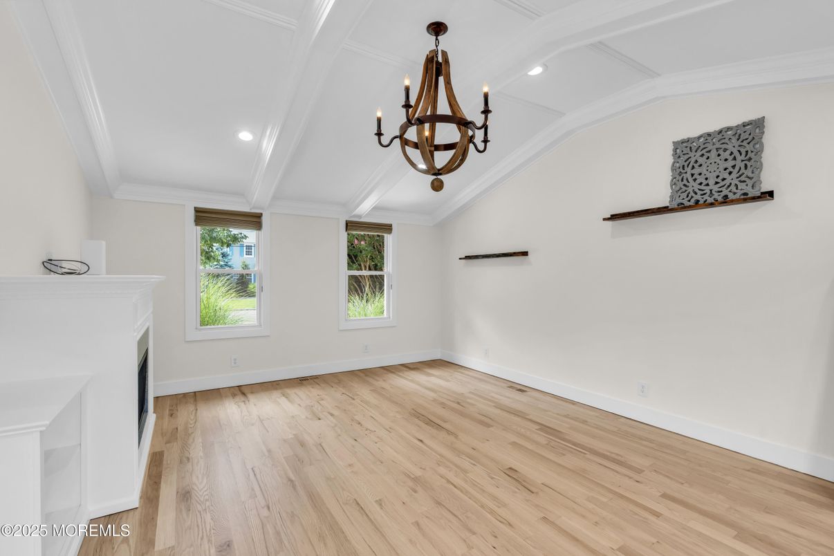 Chandelier, Empty room, Fireplace, Interior, Recessed Lighting, Wood Texture Flooring