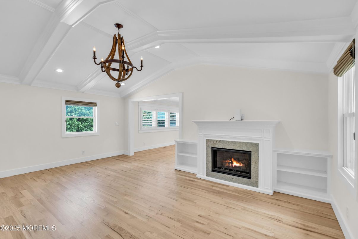 Chandelier, Empty room, Fireplace, Interior, Recessed Lighting, Wood Texture Flooring