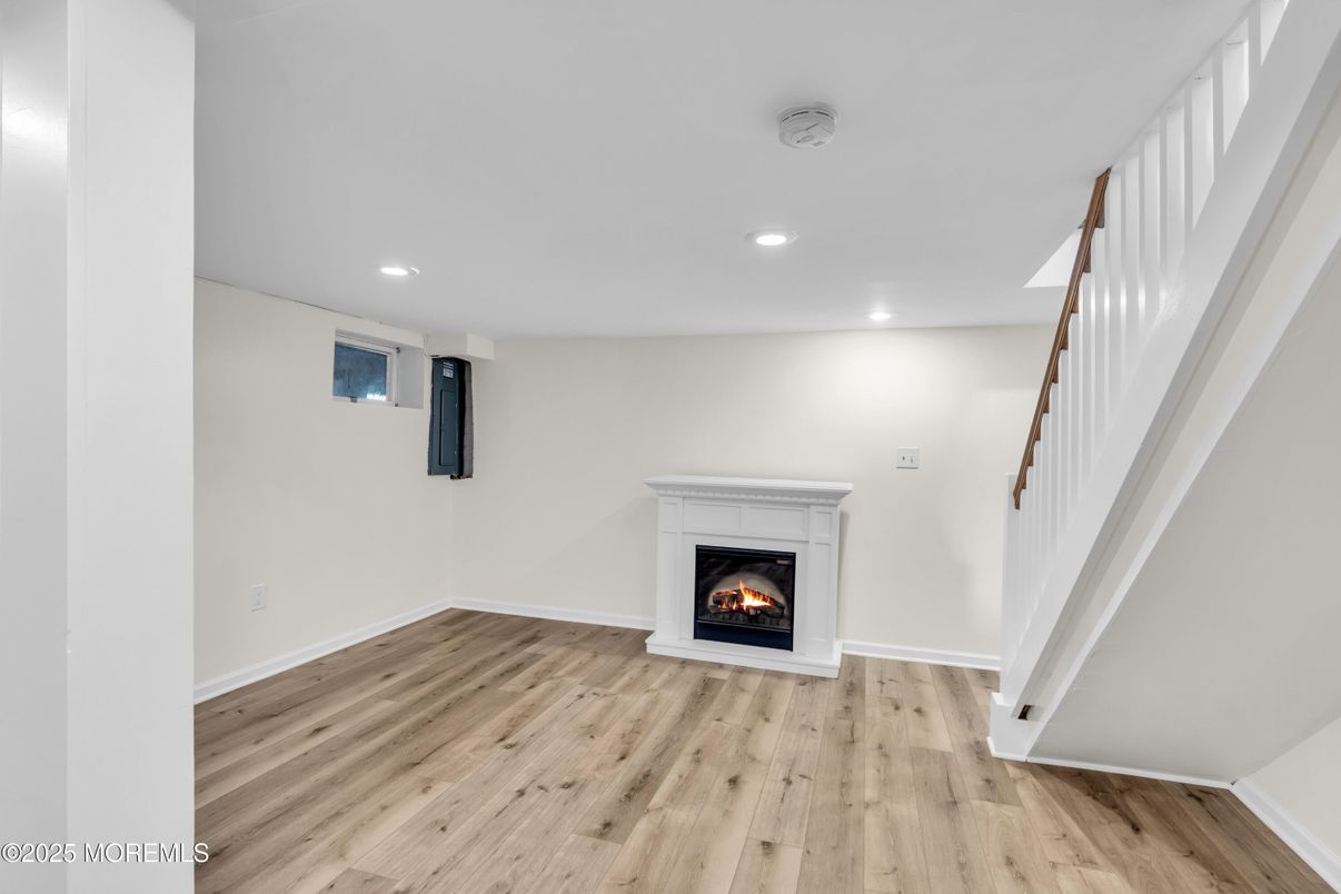 Empty room, Fireplace, Interior, Recessed Lighting, Wood Texture Flooring