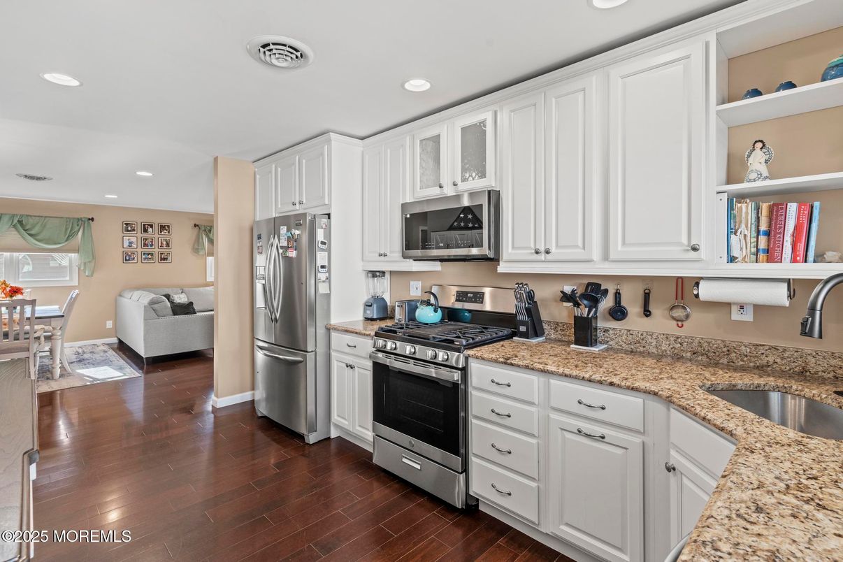 Dining room, Interior, Kitchen, Recessed Lighting, Stainless Steel Appliances, Wood Texture Flooring