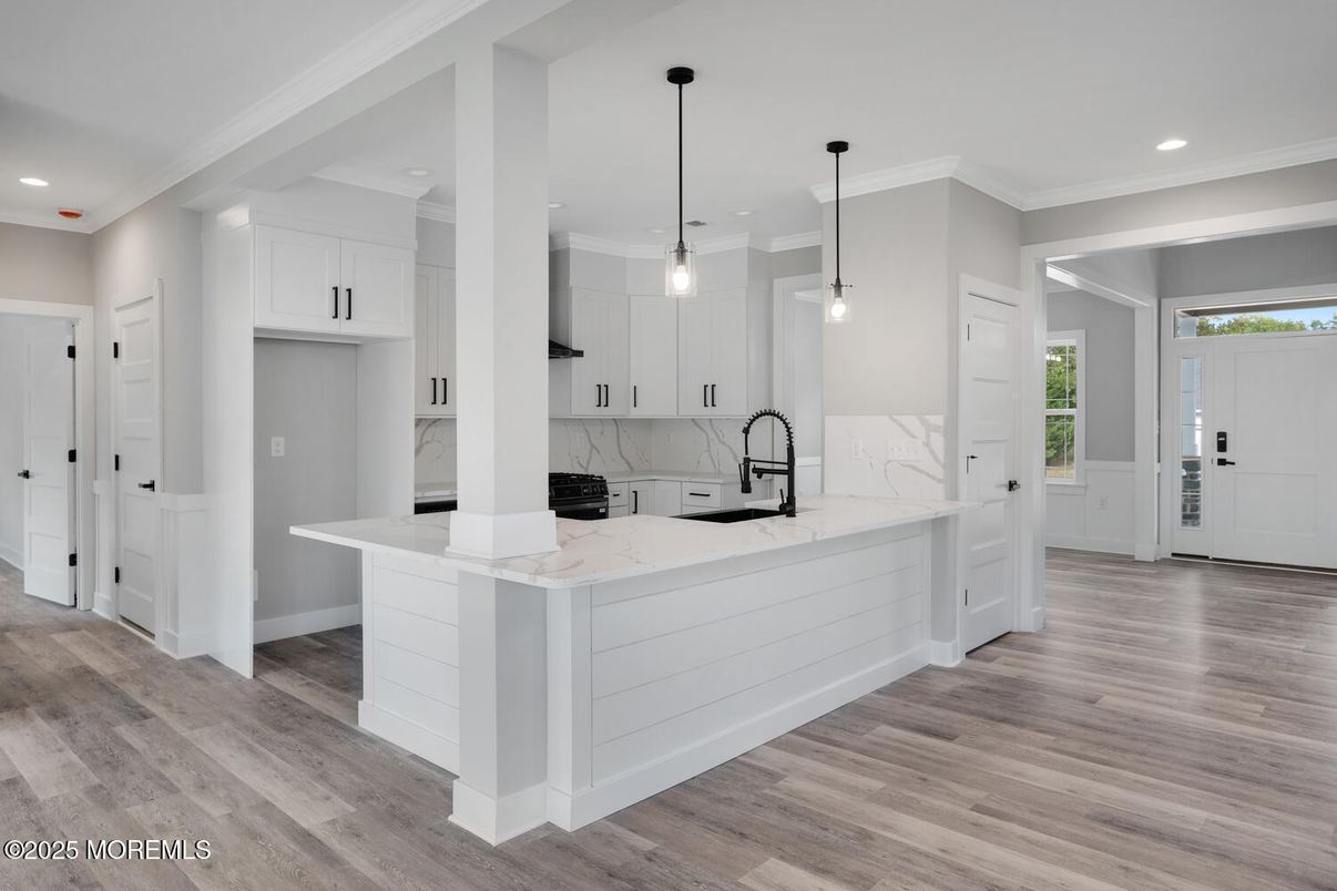 Interior, Kitchen, Marble Walls, Pendant Lights, Recessed Lighting, Wood Texture Flooring