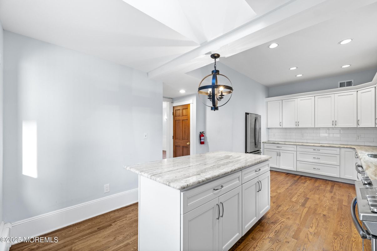 Chandelier, Interior, Kitchen, Pendant Lights, Recessed Lighting, Stainless Steel Appliances, Wood Texture Flooring