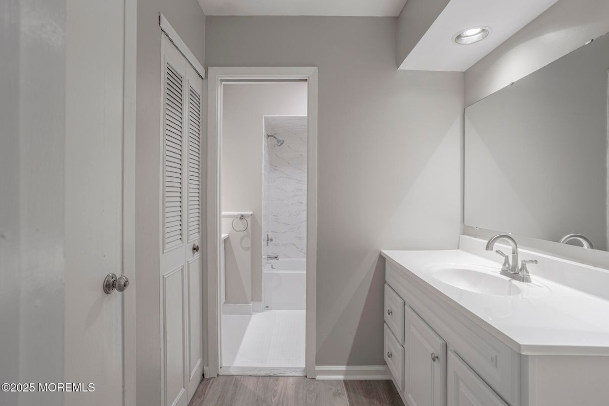 Bathroom, Interior, Marble Walls, Recessed Lighting, Wood Texture Flooring