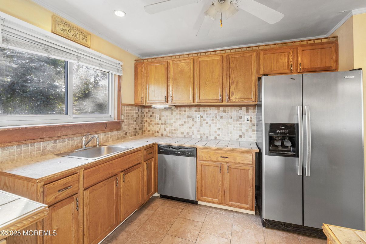 Interior, Kitchen, Recessed Lighting, Stainless Steel Appliances, Tile Countertops