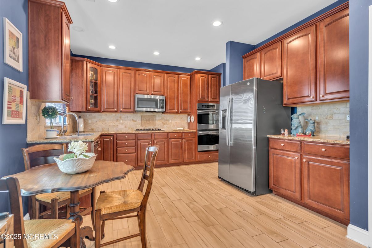 Dining room, Interior, Kitchen, Recessed Lighting, Stainless Steel Appliances, Wood Texture Flooring