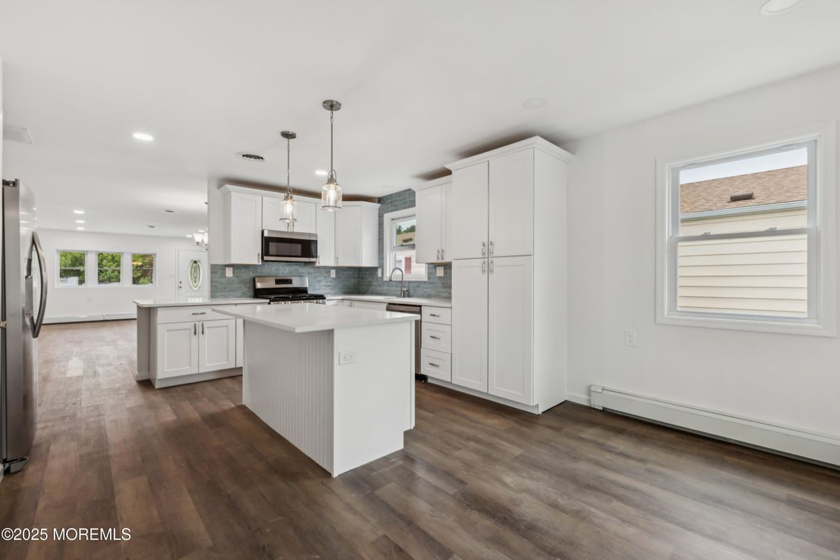 Interior, Kitchen, Pendant Lights, Recessed Lighting, Stainless Steel Appliances, Wood Texture Flooring