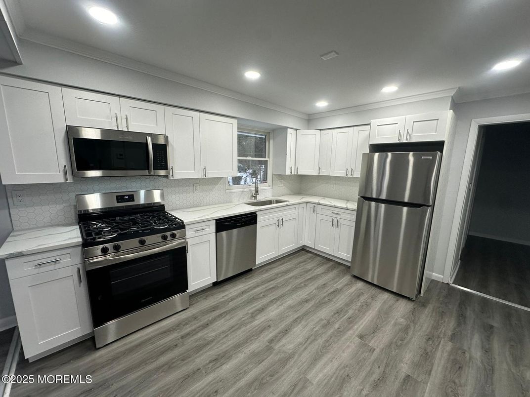 Interior, Kitchen, Recessed Lighting, Stainless Steel Appliances, Wood Texture Flooring