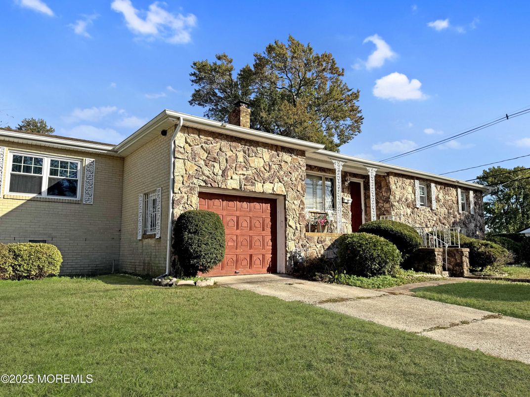 Attached, Backyard, Exterior, Facade, Brick Facade, Ranch