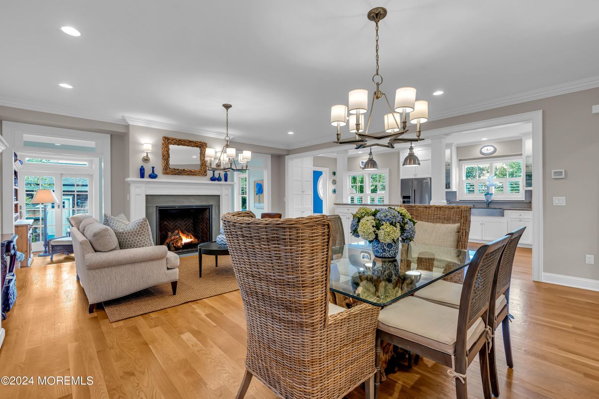 Chandelier, Dining room, Fireplace, Interior, Living room, Recessed Lighting, Wood Texture Flooring