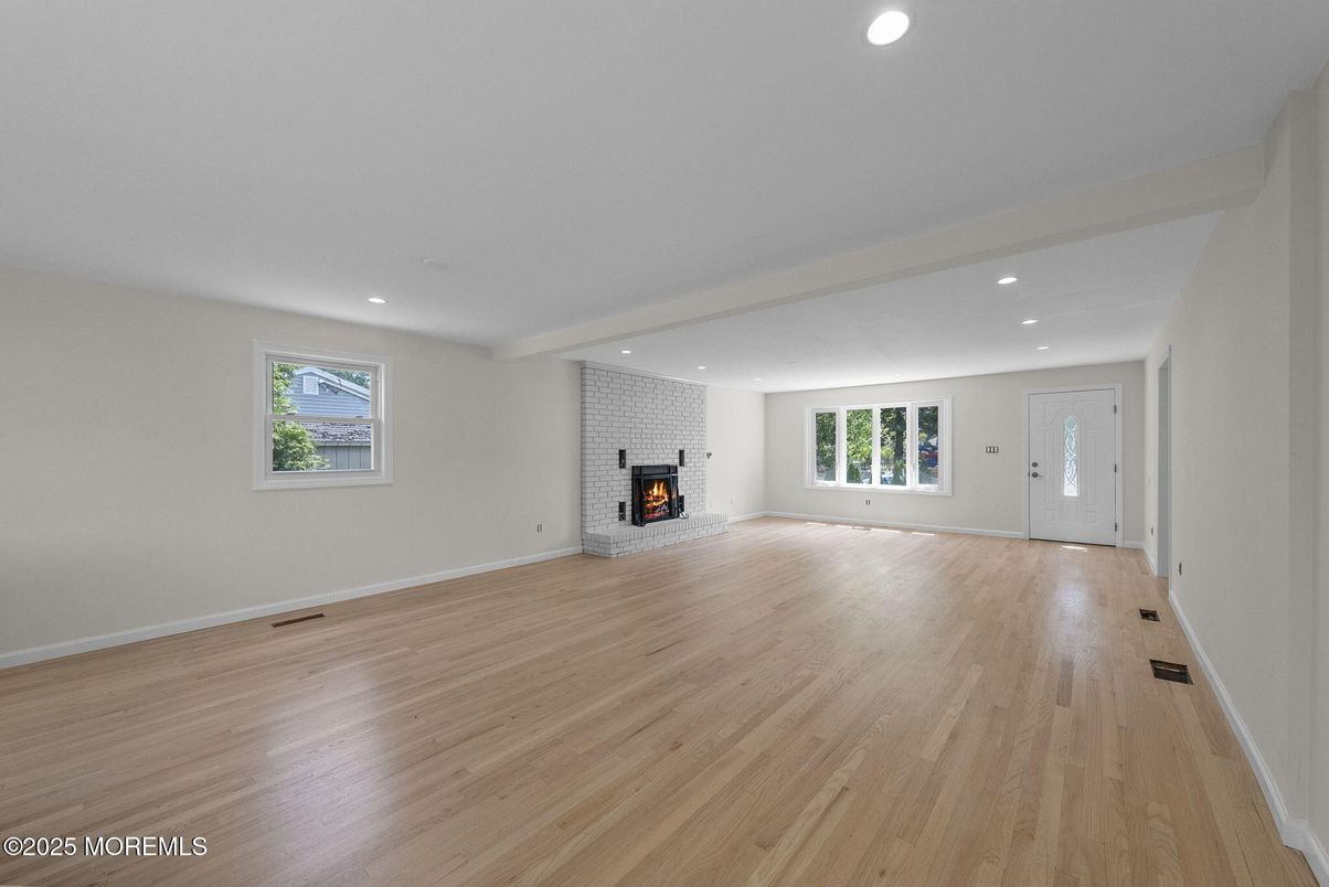 Empty room, Fireplace, Interior, Recessed Lighting, Wood Texture Flooring