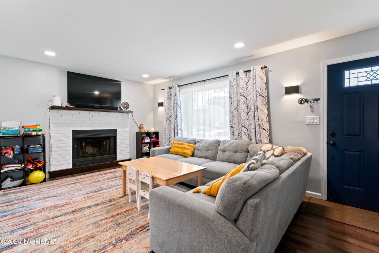 Fireplace, Interior, Living room, Recessed Lighting, Wood Texture Flooring