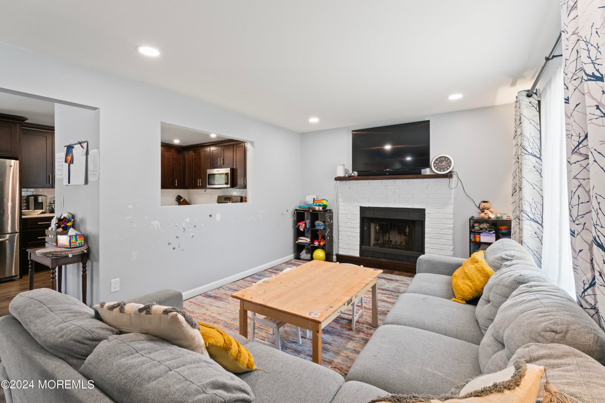 Fireplace, Interior, Living room, Recessed Lighting, Wood Texture Flooring