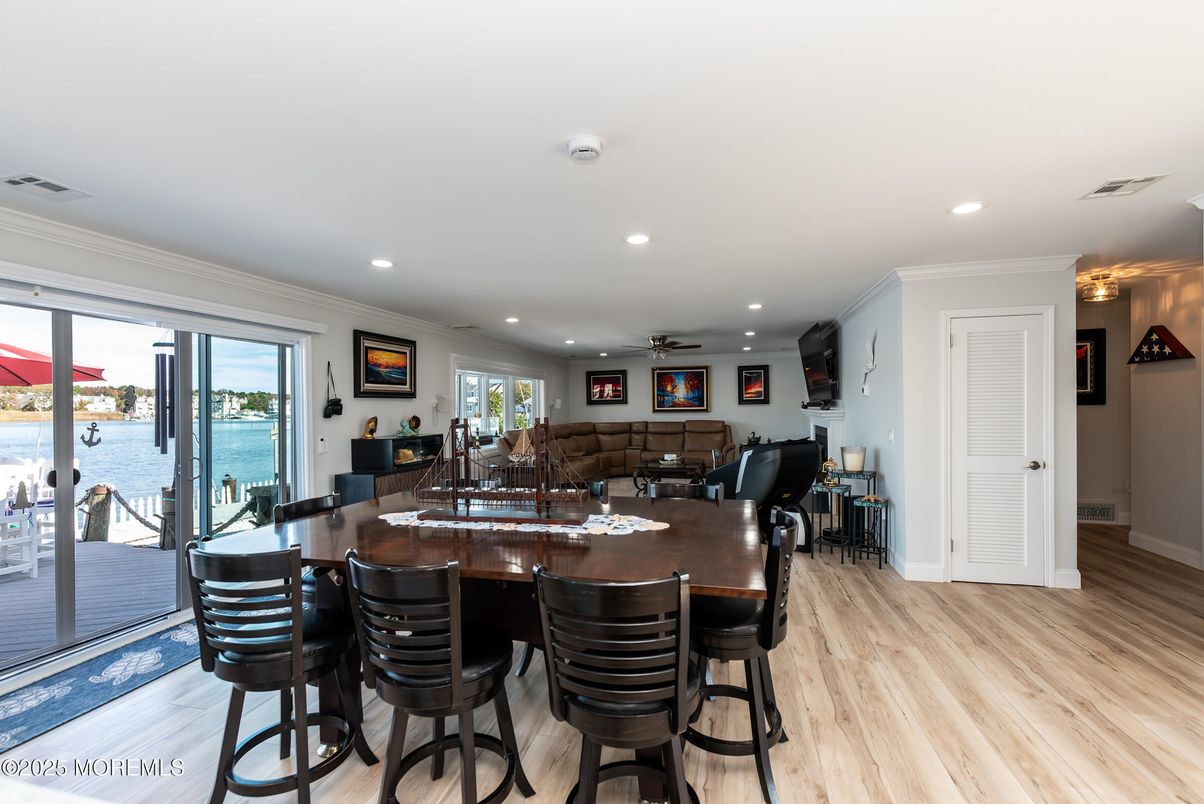 Dining room, Interior, Living room, Recessed Lighting, Water, Wood Texture Flooring