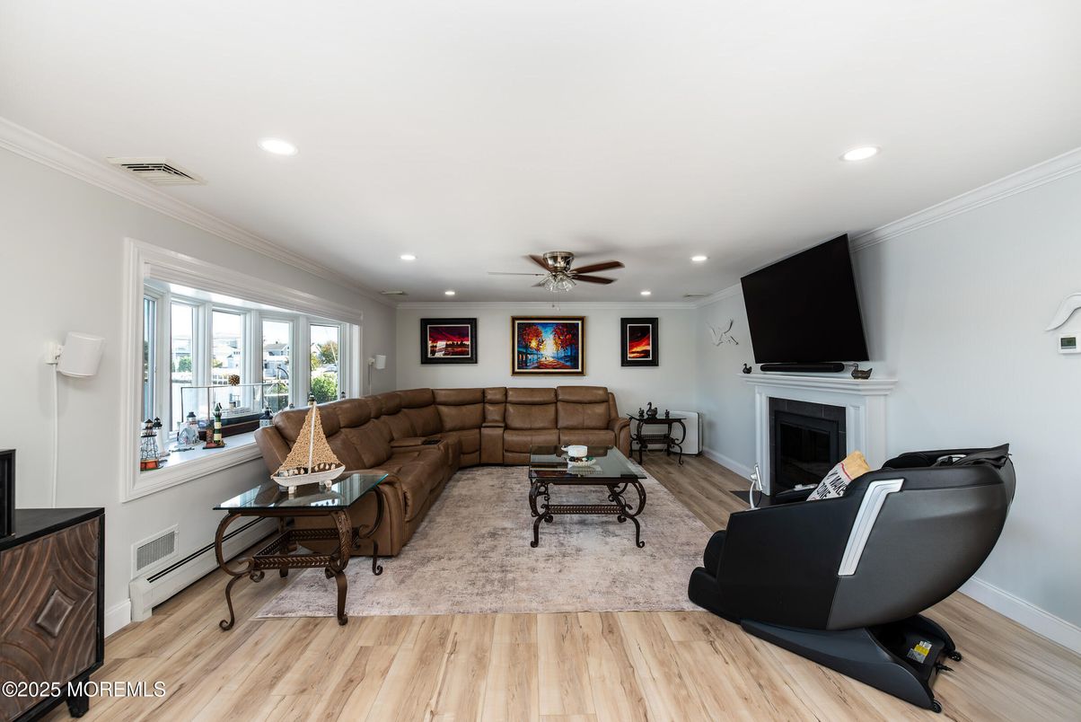 Fireplace, Interior, Living room, Recessed Lighting, Wood Texture Flooring