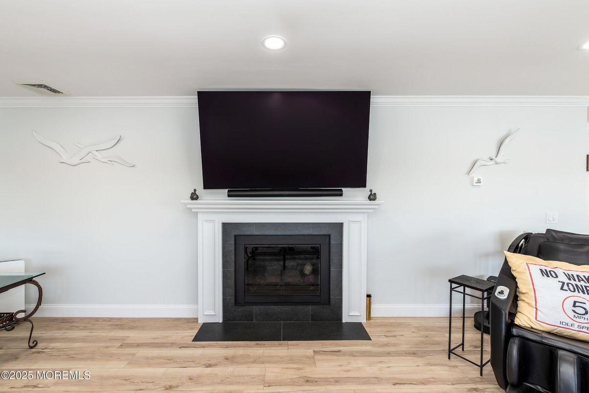 Fireplace, Interior, Recessed Lighting, Wood Texture Flooring