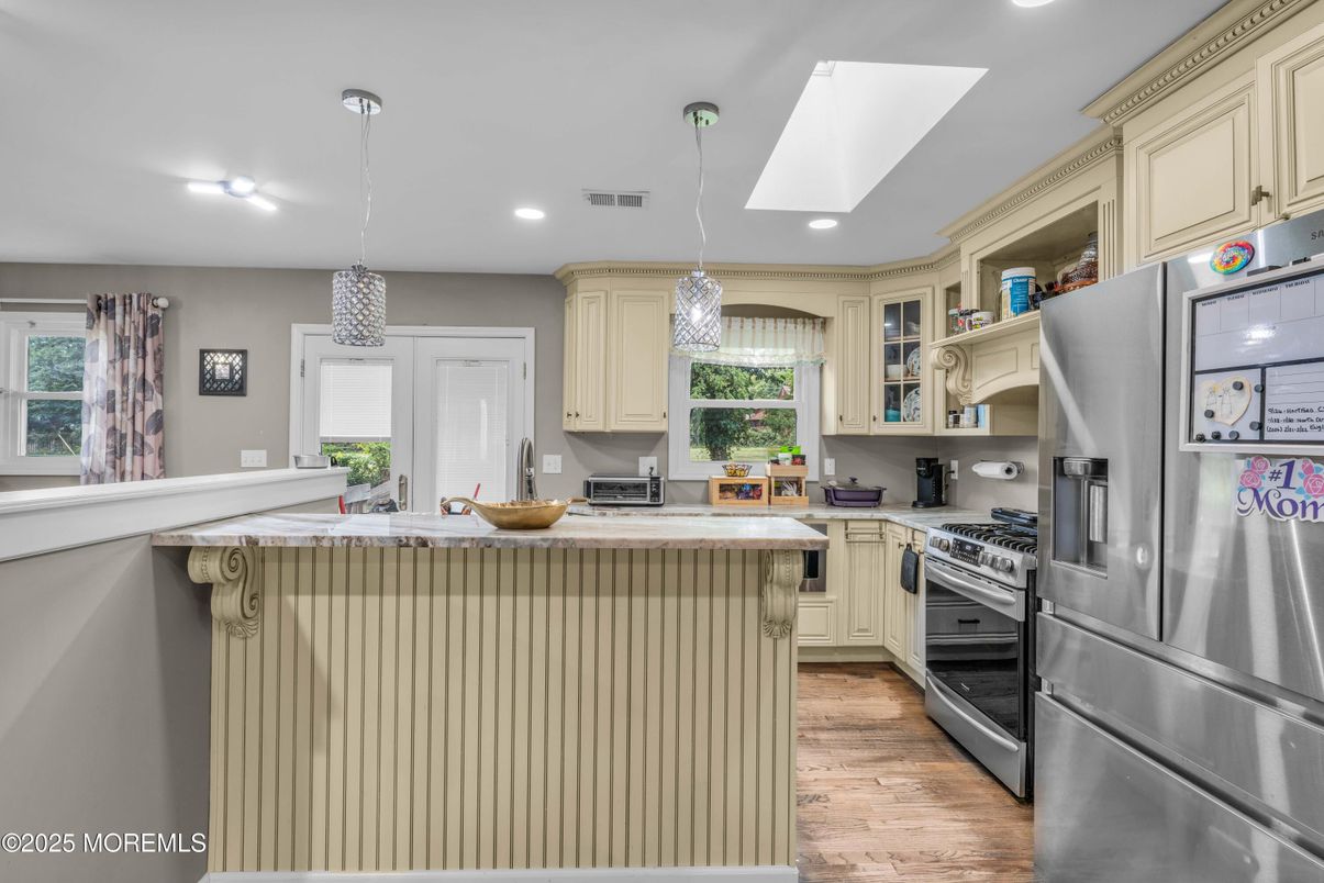 Chandelier, Interior, Kitchen, Pendant Lights, Recessed Lighting, Stainless Steel Appliances, Wood Texture Flooring