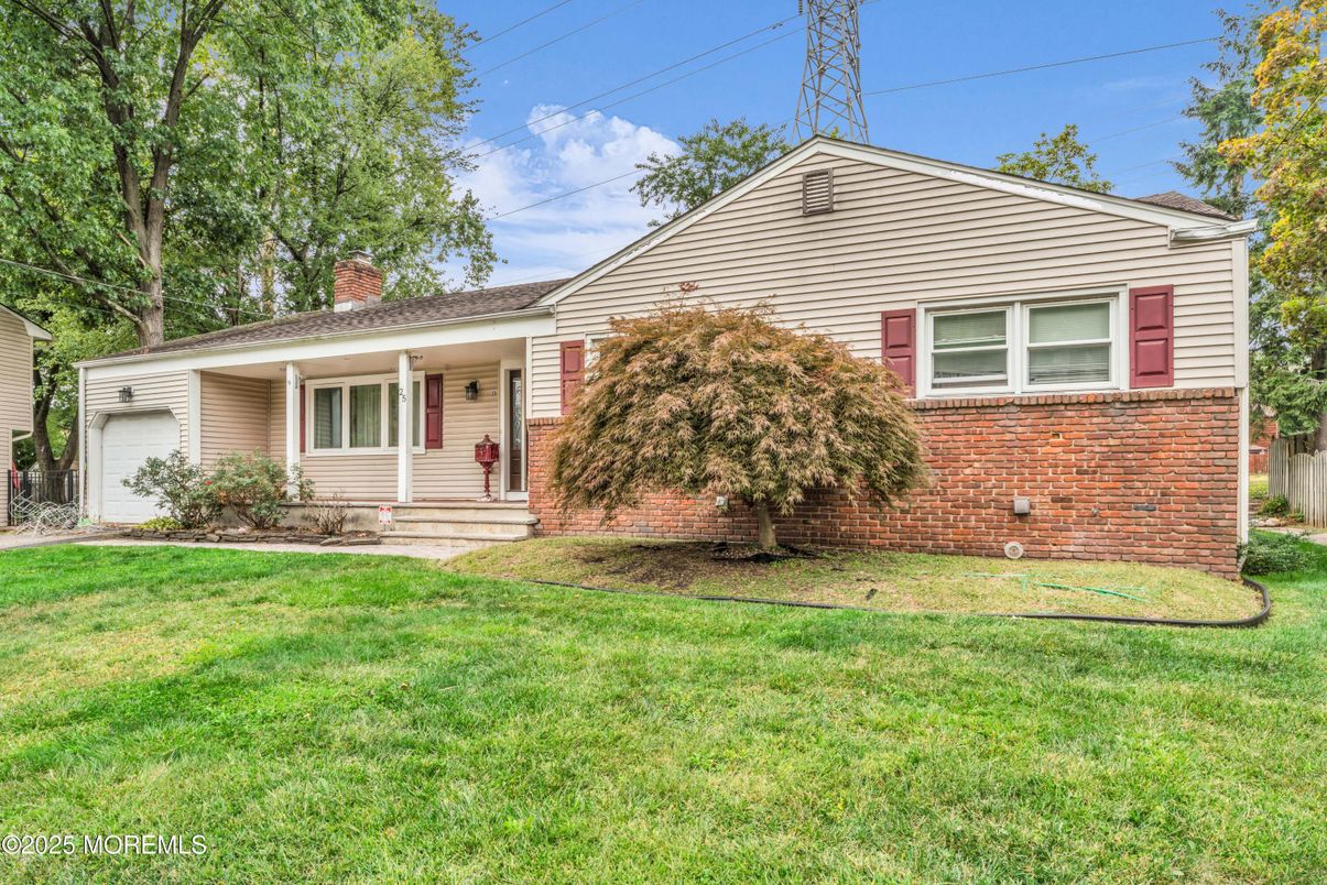 Attached, Backyard, Exterior, Facade, Brick Facade, Split Level