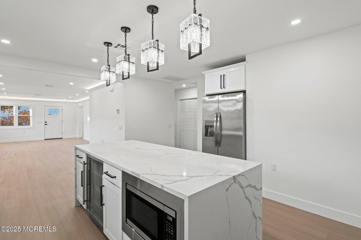 Interior, Kitchen, Pendant Lights, Recessed Lighting, Stainless Steel Appliances, Wood Texture Flooring
