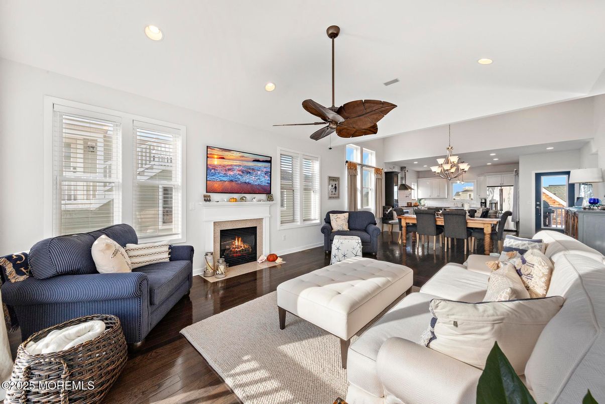 Chandelier, Dining room, Fireplace, Interior, Kitchen, Living room, Pendant Lights, Recessed Lighting, Wood Texture Flooring