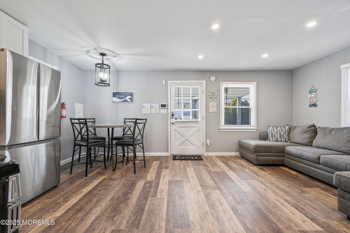 Dining room, Interior, Kitchen, Living room, Pendant Lights, Recessed Lighting, Stainless Steel Appliances, Wood Texture Flooring