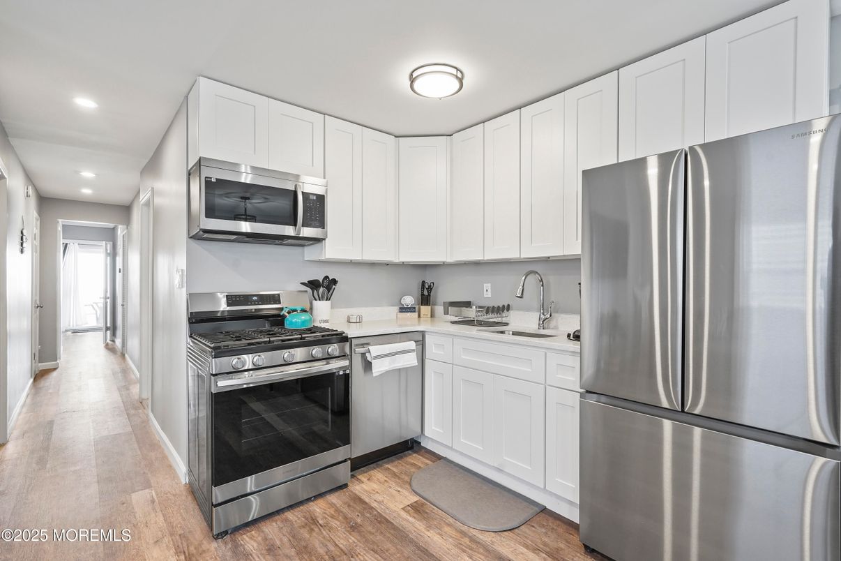 Interior, Kitchen, Recessed Lighting, Stainless Steel Appliances, Wood Texture Flooring